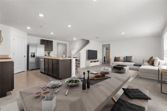 living room featuring light tile patterned floors