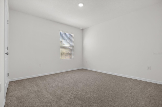 view of carpeted spare room