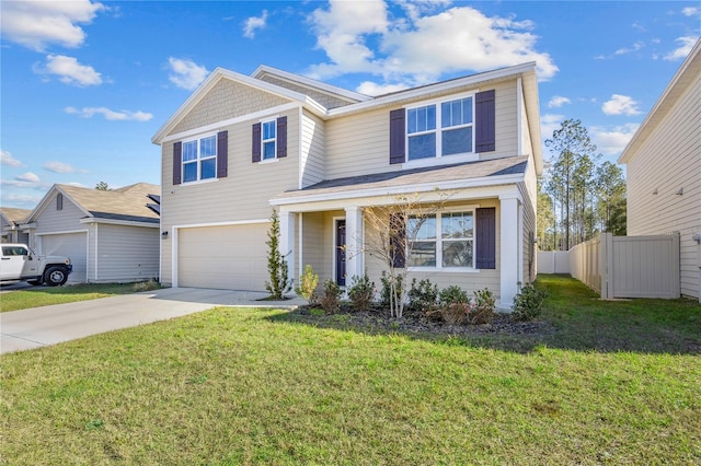 view of front of home featuring a front lawn and a garage