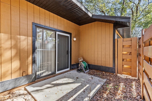 doorway to property with a patio area