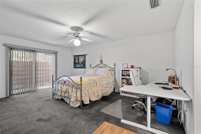 bedroom with dark carpet and ceiling fan