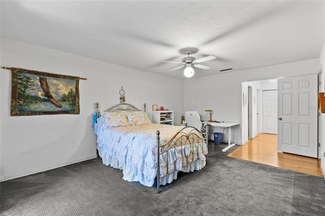 carpeted bedroom featuring ceiling fan