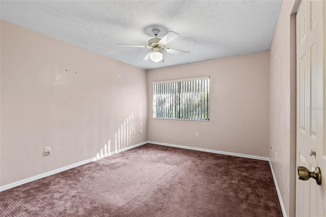 carpeted empty room with ceiling fan