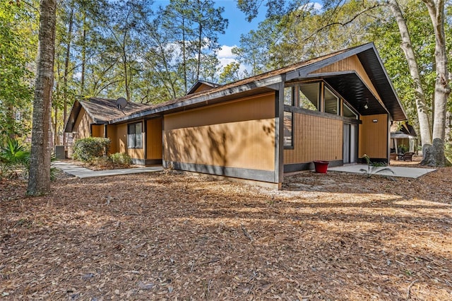 view of home's exterior with a patio area