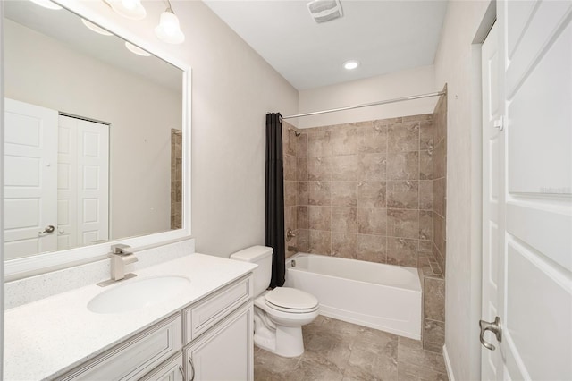 full bathroom featuring vanity, toilet, and shower / bath combo with shower curtain