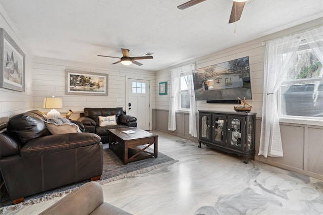 living room featuring ceiling fan