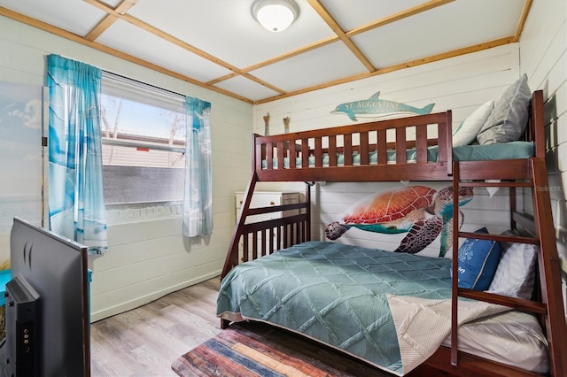 bedroom with hardwood / wood-style floors