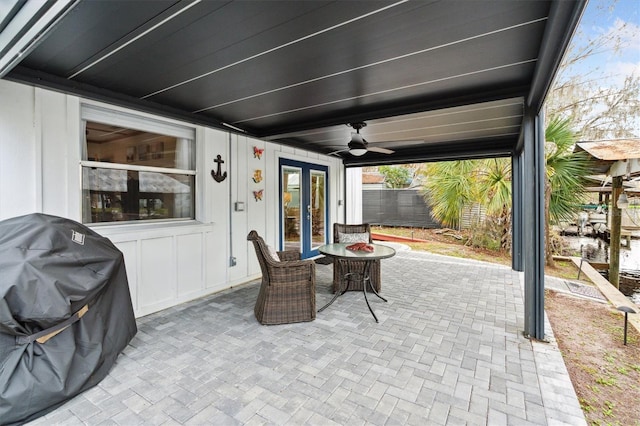 view of patio with ceiling fan, french doors, and area for grilling