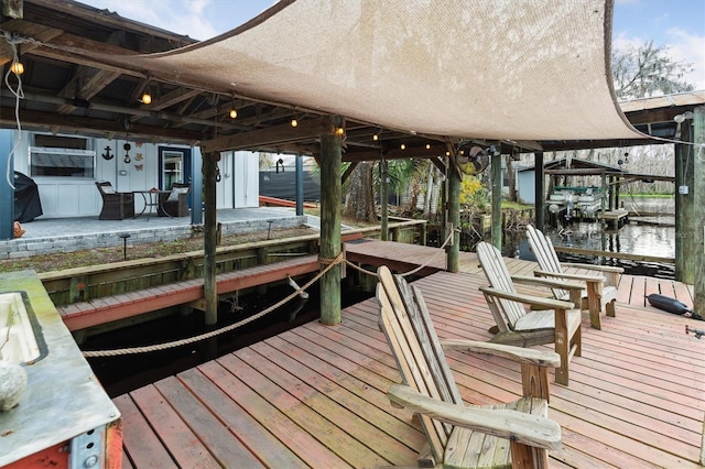 dock area featuring a water view