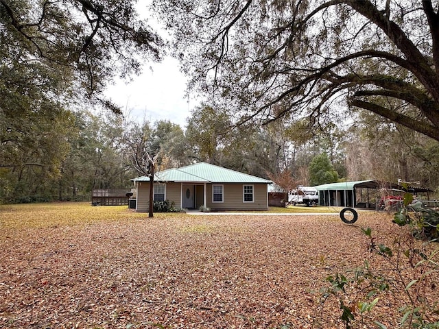 exterior space featuring a carport