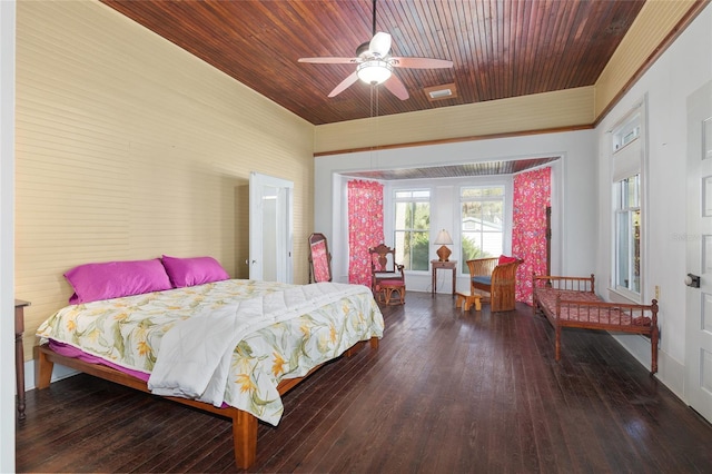 bedroom with ceiling fan, wood ceiling, and hardwood / wood-style flooring