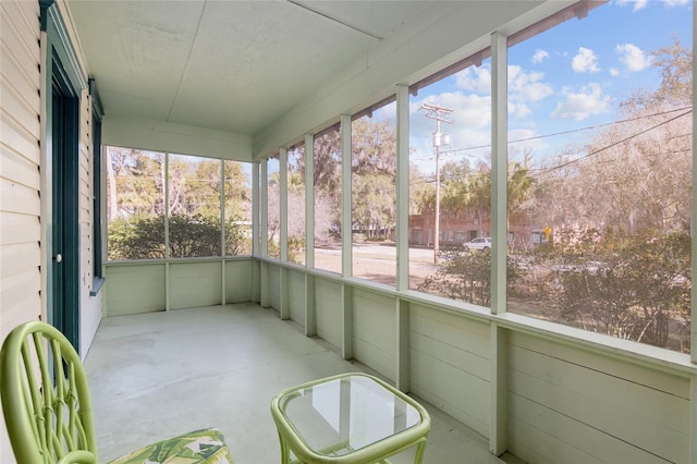 unfurnished sunroom with a wealth of natural light