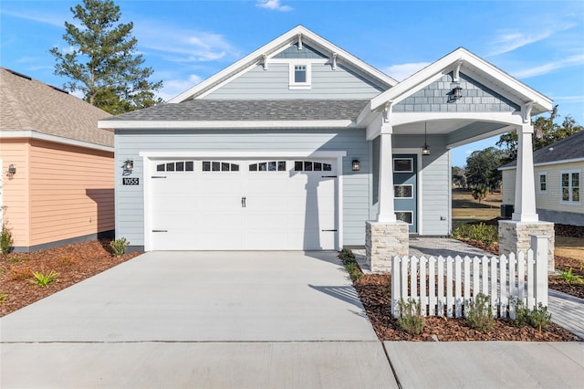 craftsman-style house featuring a garage