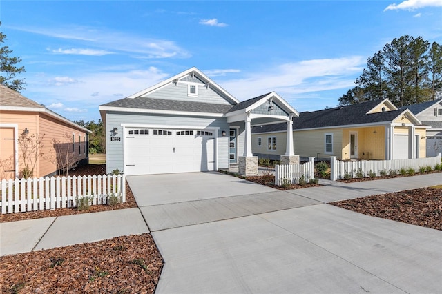 craftsman house with a garage