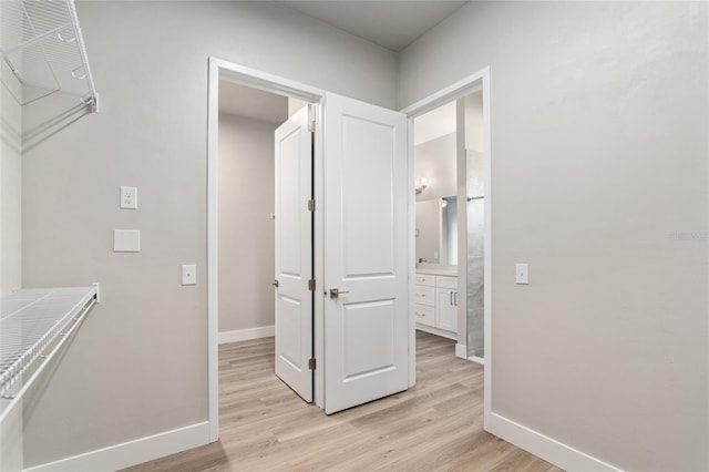 hallway featuring light wood-type flooring