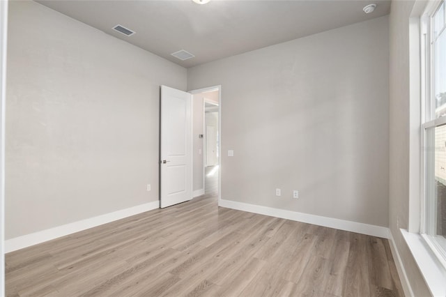 empty room featuring light hardwood / wood-style floors