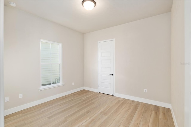 unfurnished room featuring light hardwood / wood-style floors