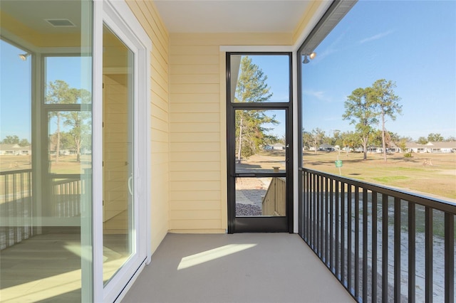 unfurnished sunroom featuring a healthy amount of sunlight