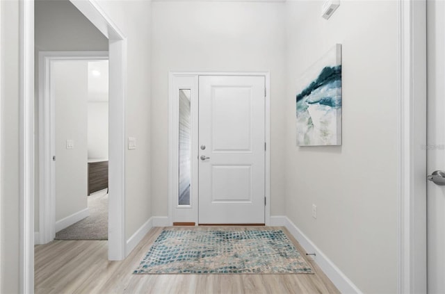 entrance foyer featuring light wood-type flooring