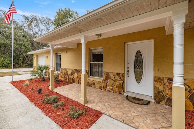 entrance to property with a garage