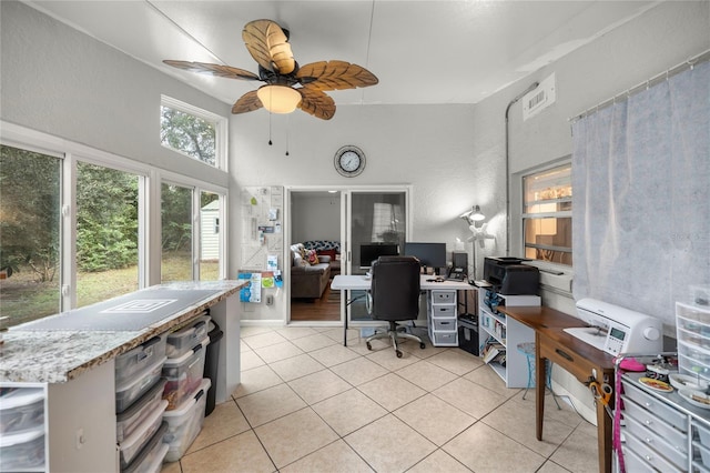 tiled home office with ceiling fan