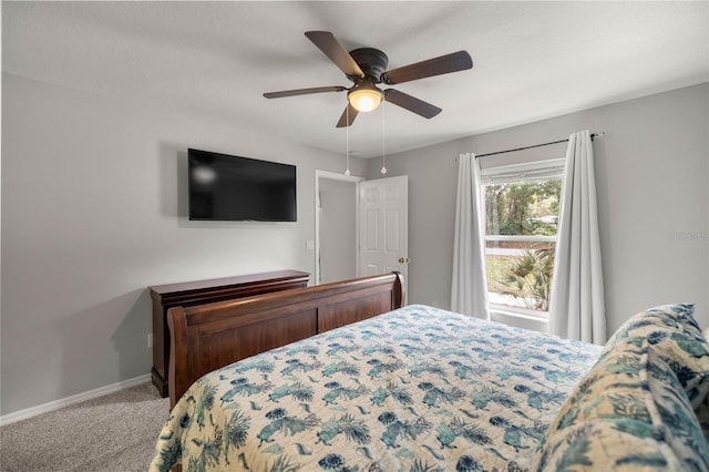 bedroom with ceiling fan and carpet flooring