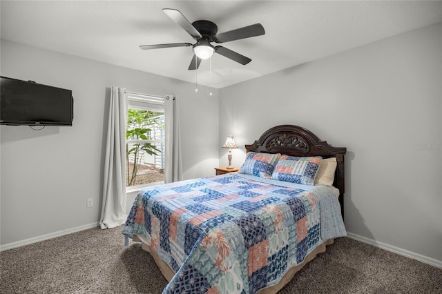 bedroom with ceiling fan and carpet floors