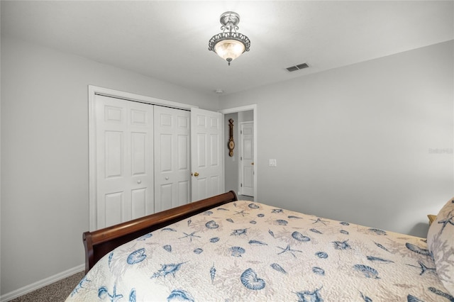 bedroom featuring carpet and a closet