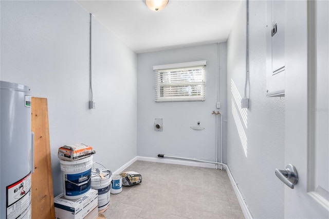 laundry area featuring water heater and hookup for an electric dryer