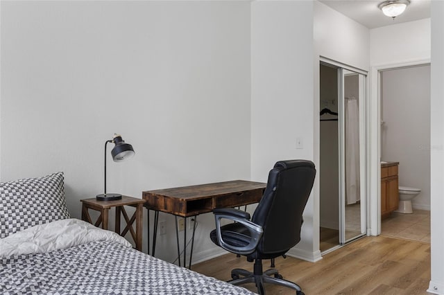 bedroom with light hardwood / wood-style flooring