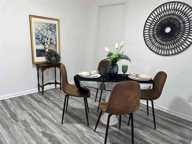 dining room featuring hardwood / wood-style flooring