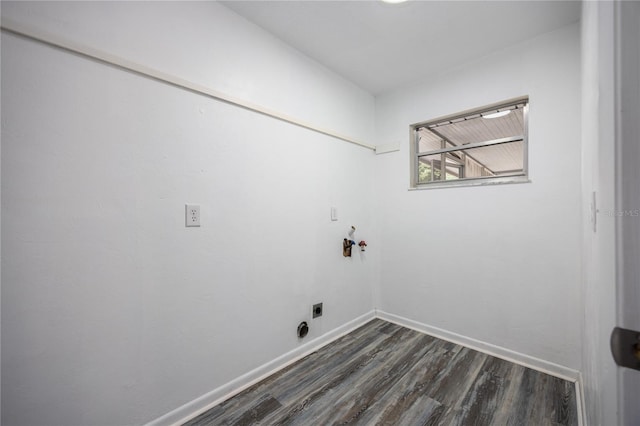 clothes washing area with hookup for a washing machine, dark hardwood / wood-style flooring, and hookup for an electric dryer