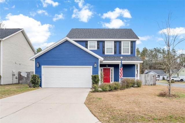 view of front facade with a garage, a front yard, and covered porch