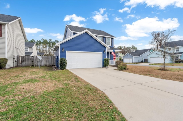 view of front of house with a garage and a front yard