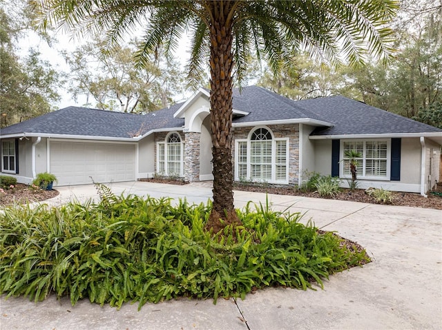 ranch-style home featuring a garage