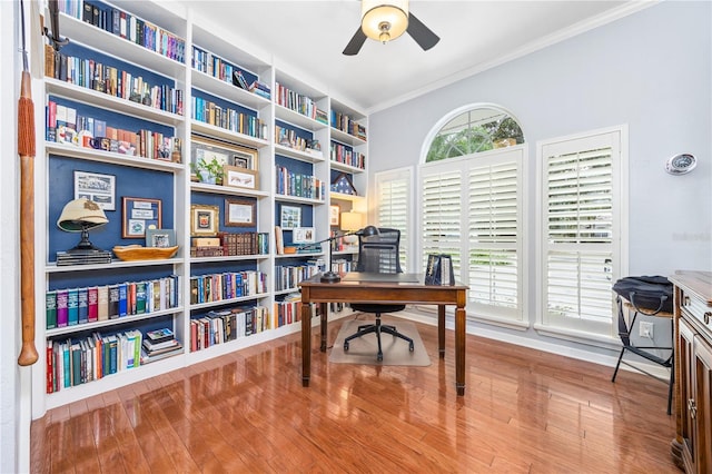 office space featuring ceiling fan, crown molding, and hardwood / wood-style floors