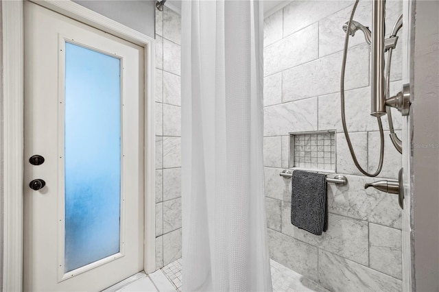 bathroom featuring walk in shower