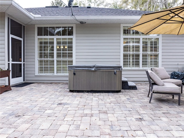 view of patio featuring a hot tub