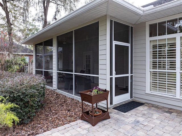 doorway to property with a patio area