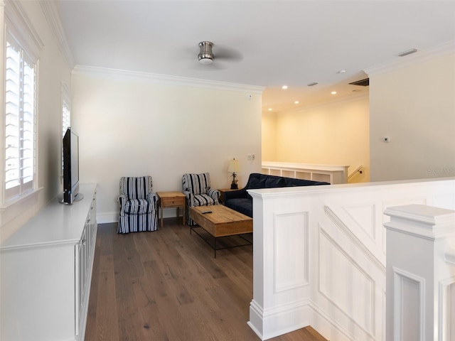 interior space featuring white cabinetry, ornamental molding, and dark hardwood / wood-style flooring