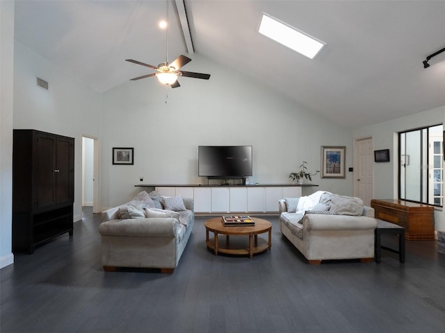 living room with dark hardwood / wood-style flooring, ceiling fan, high vaulted ceiling, and beamed ceiling