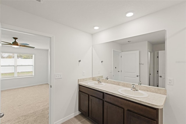 bathroom featuring ceiling fan, vanity, and tile patterned floors