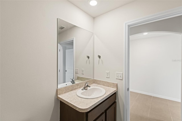 bathroom featuring vanity and tile patterned flooring