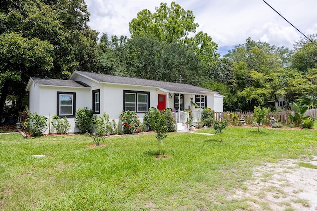 ranch-style house with a front yard