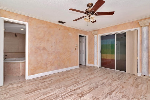 unfurnished room with ceiling fan