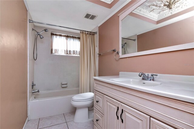 full bathroom featuring shower / bathtub combination with curtain, tile patterned floors, toilet, and vanity