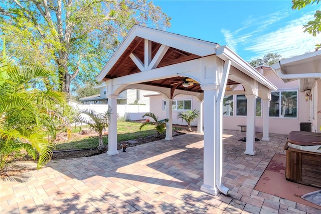 view of patio featuring a gazebo and ceiling fan