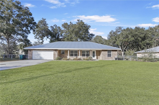 ranch-style house with a front lawn and a garage