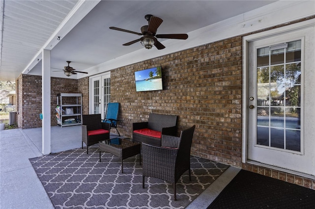 view of patio featuring ceiling fan