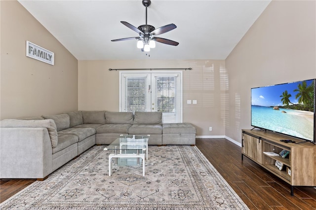 living room with ceiling fan, dark hardwood / wood-style flooring, and lofted ceiling